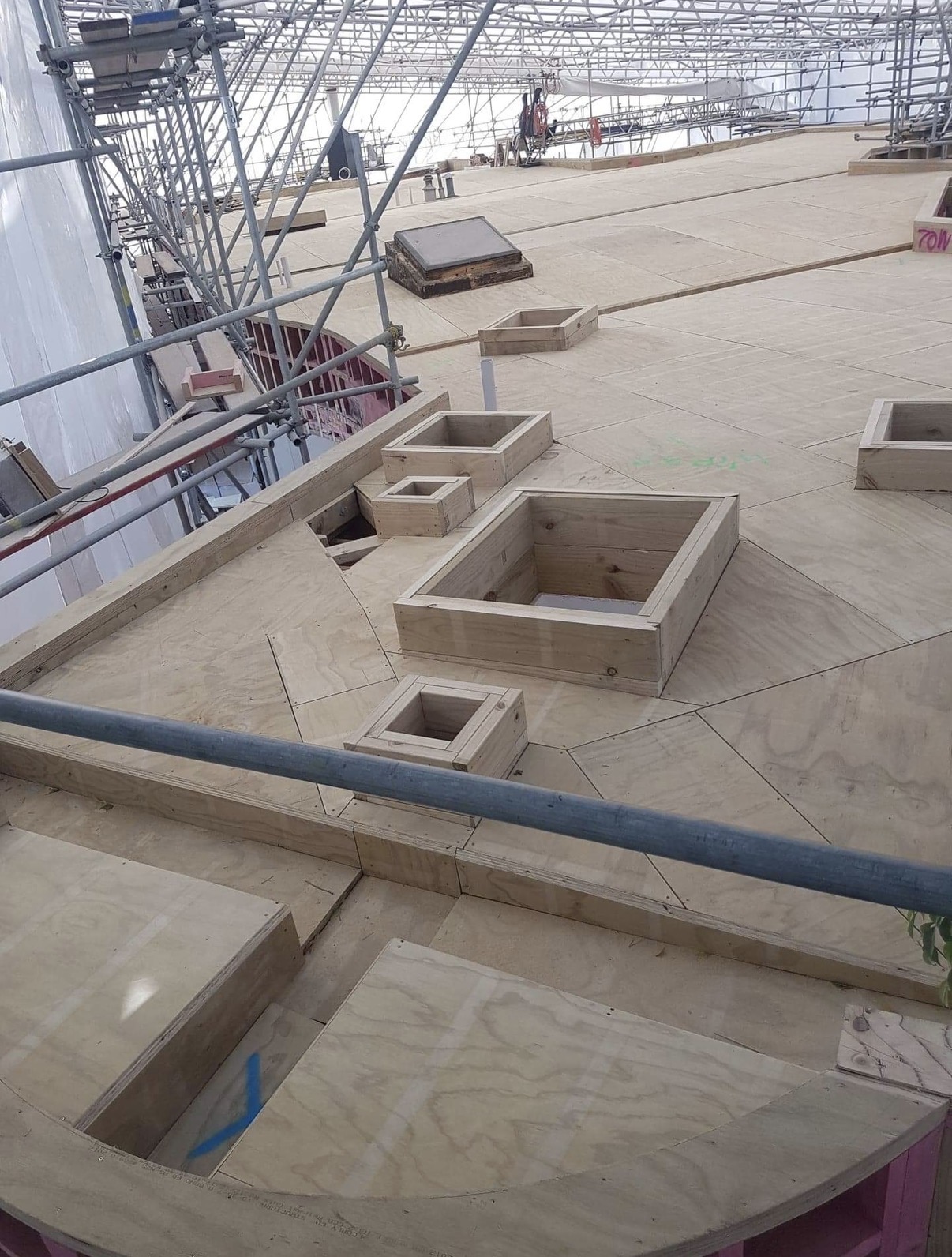 Complex roof construction with intricate falls, internal gutters and framing for numerous skylights at the Herne Bay project