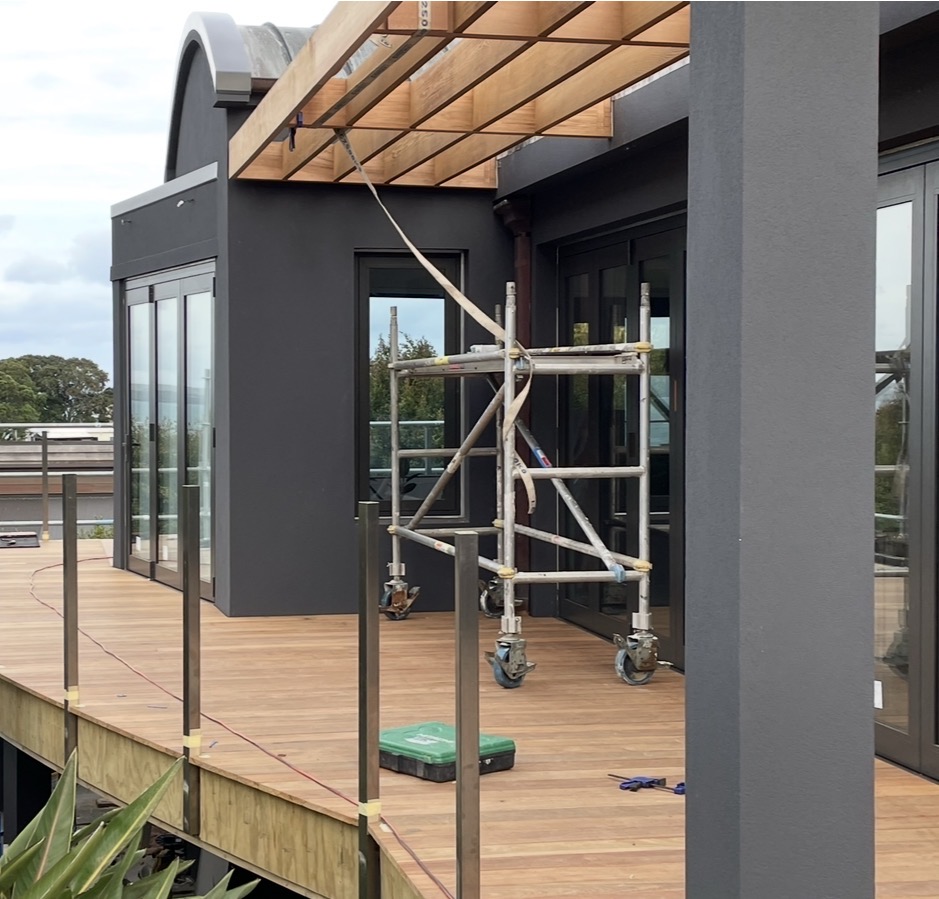 Spotted gum decking and cedar pergola during construction.