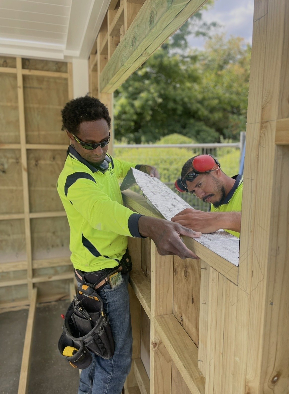 Preparing the framed window opening.