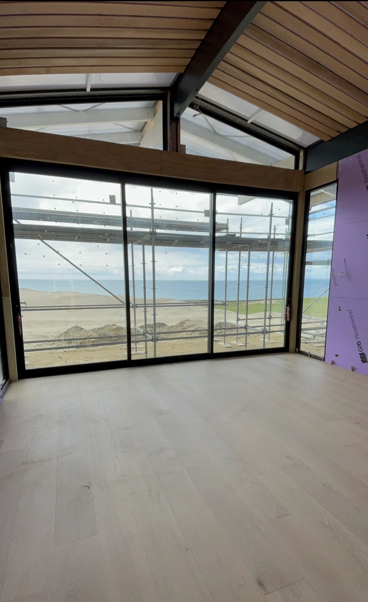 Timber ceiling details and interior lining work.